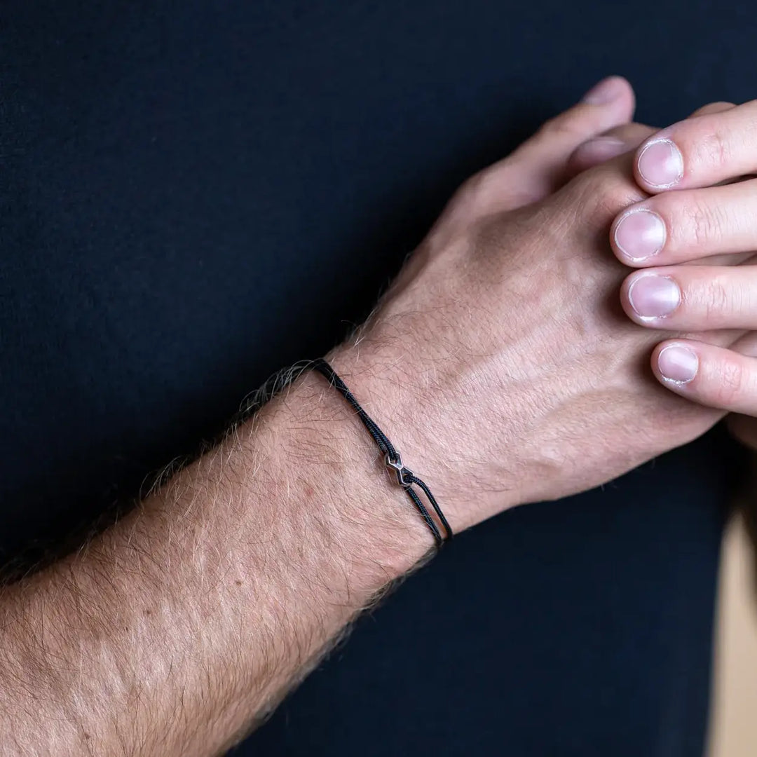 Nylonarmband 1,5 mm, schwarz, Infinity-Zeichen sillber